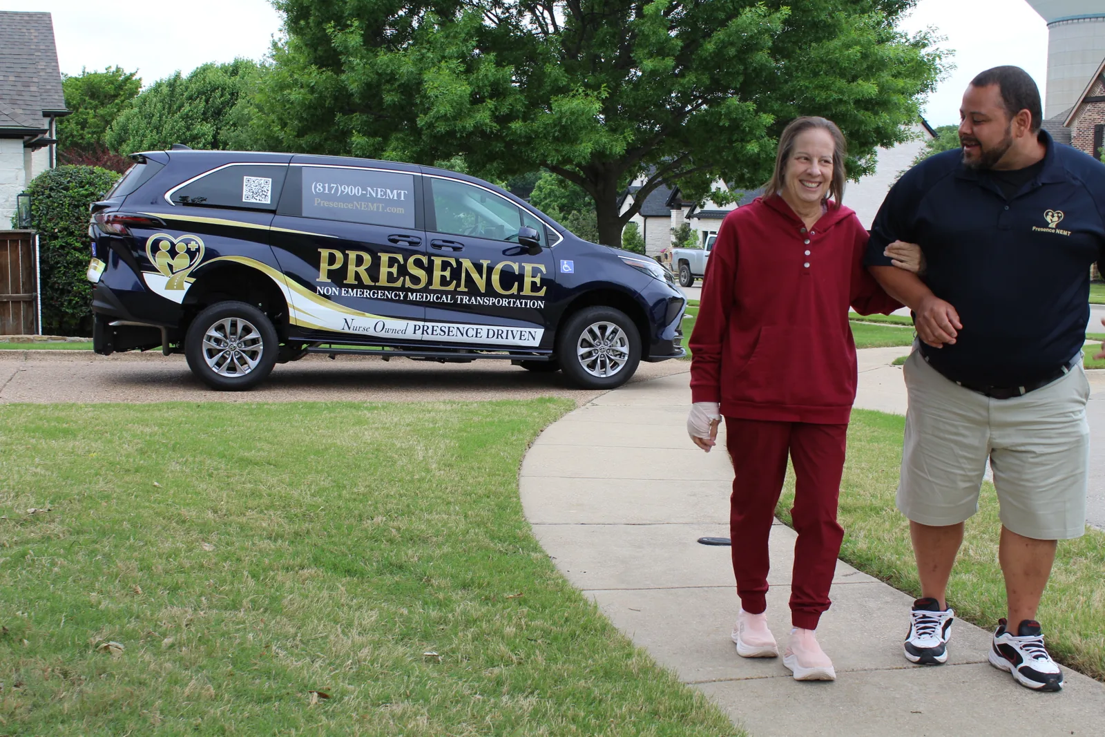 Presence NEMT driver assisting a passenger into the wheelchair-accessible van in Fort Worth